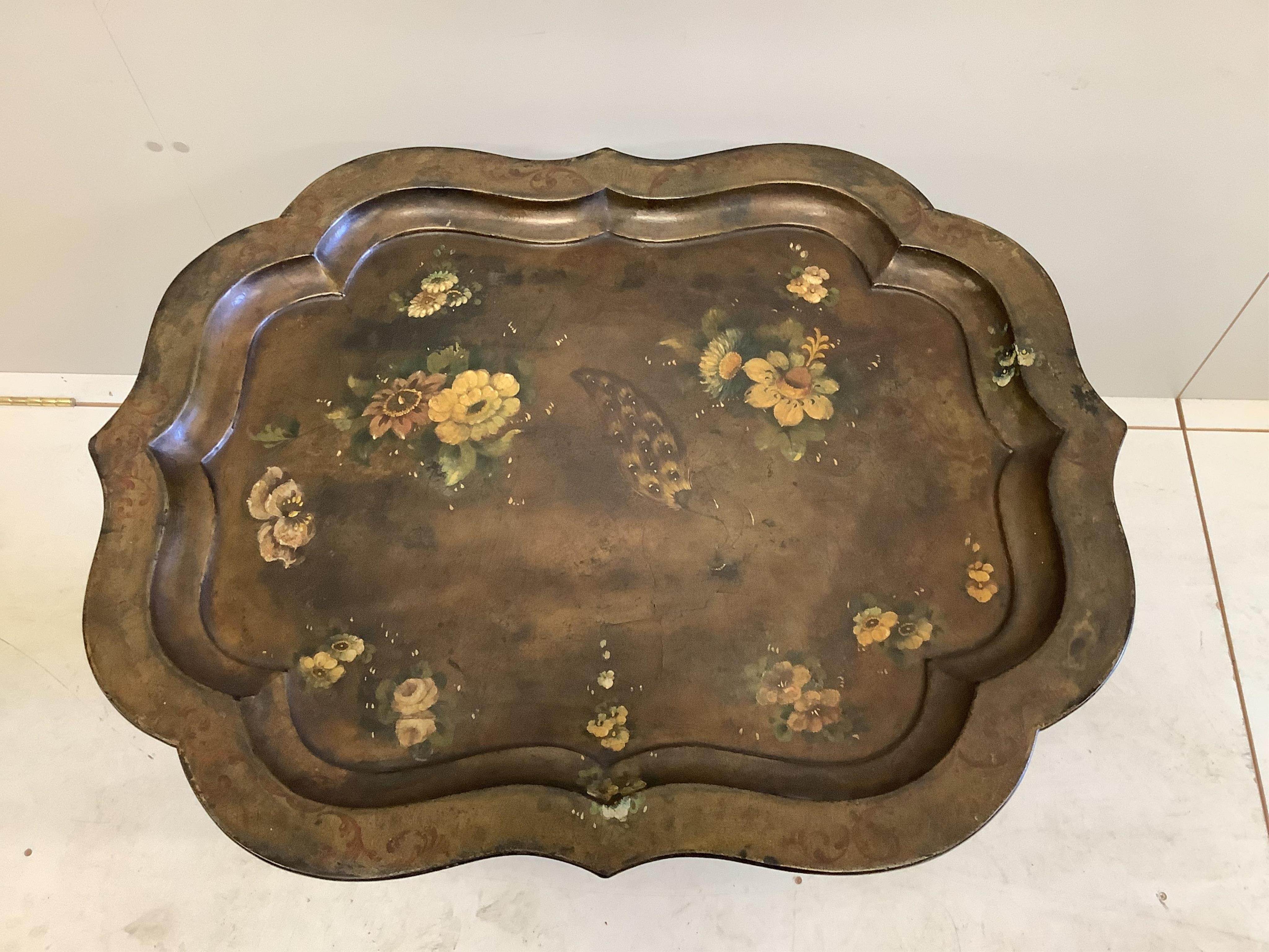 A Victorian painted papier mache tilt top occasional table, width 80cm, depth 64cm, height 55cm